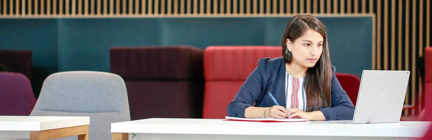 Female student with laptop