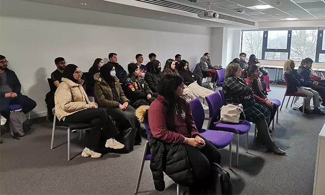 A group of students in a lecture theatre
