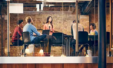 A group of creative professionals in an office