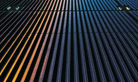 A solar farm during a sunset