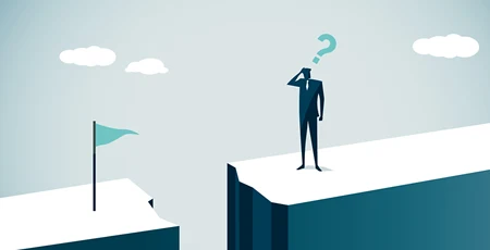 A silhouette of a person with a blue question mark above him and he is standing on a rock with an illustration of a blue flag on the rock next to him.