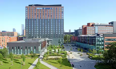 An image of the Alliance Manchester Business School during a sunny day.