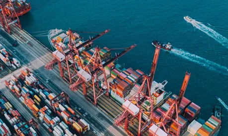 An aerial view of colourful containers in the ship terminal of Hong Kong Harbour