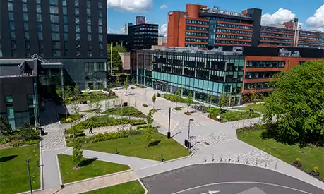 The Alliance Manchester Business School building in the sunshine
