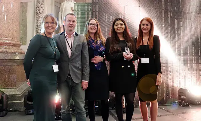 Tania (second right) receives her Innovate UK award