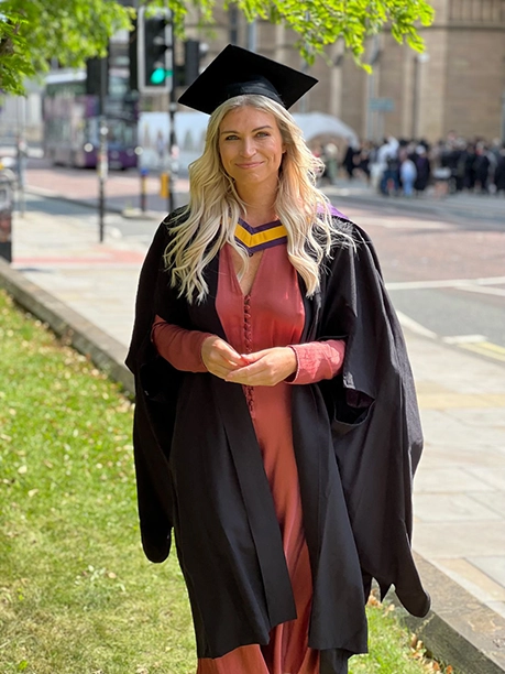 female student in graduation gown