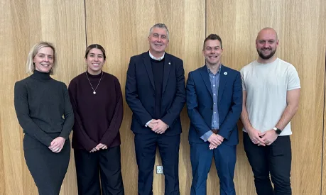 AMBS colleagues with representatives from the MCFA