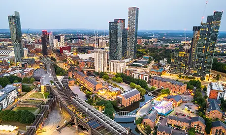 Cityscape image of Manchester at dusk